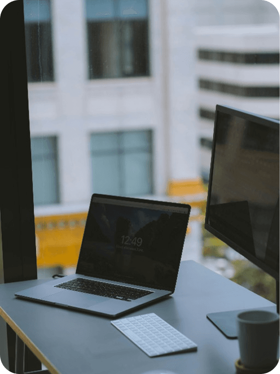 Laptop and monitor set up on a desk